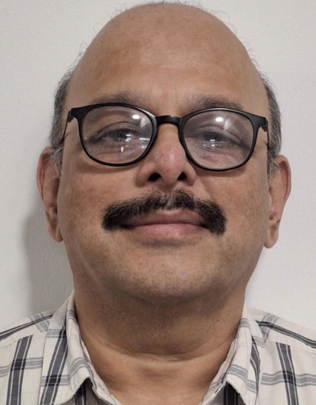 Dr. Milind Mujumdar